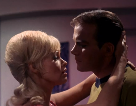 Eve embraces Kirk