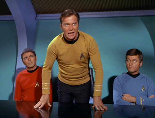 Kirk rages in the conference room