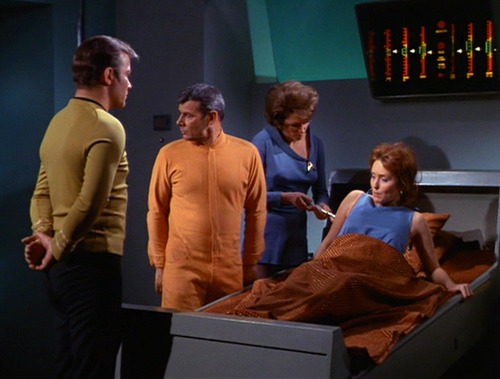 Kirk, in Janice's body, wakes up in Sickbay