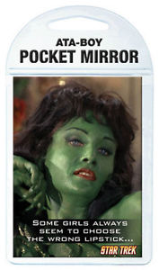 Mirror with photo of Vina as an Orion slave girl and the caption "Some girls always seem to choose the wrong lipstick"