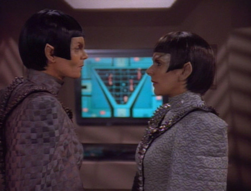 Troi as Rakal talks to Commander Toreth in "Face of the Enemy"