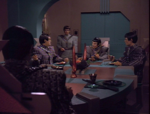 Troi arrives at the Romulan officers' dinner