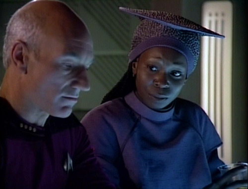 Guinan talks to Picard in Ten Forward