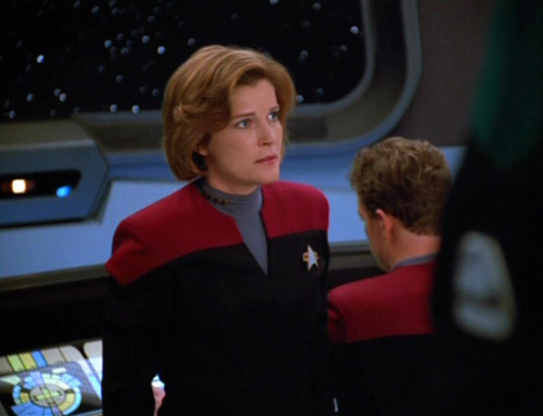 Janeway looks with disappointment at The Doctor