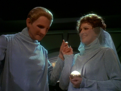 Odo and Lwaxana in their wedding clothes