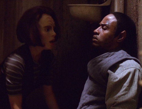B'Elanna looks at Tuvok's bruised face