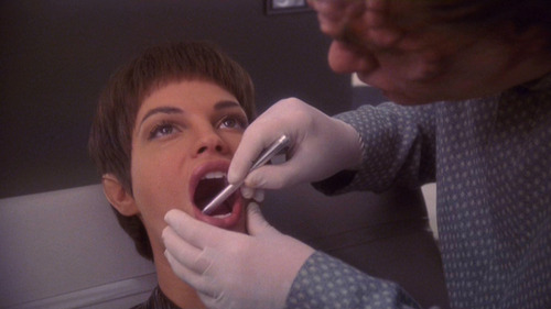 Phlox works on T'Pol's teeth