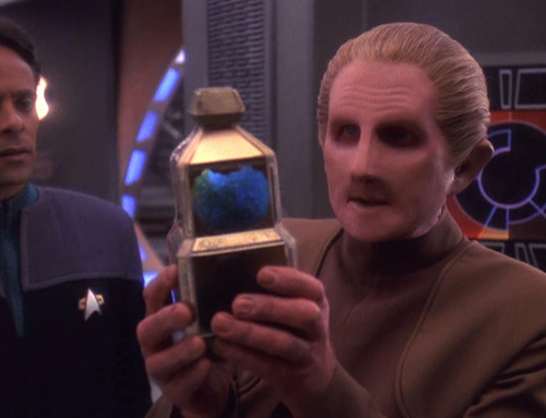 Odo looks at the baby changeling