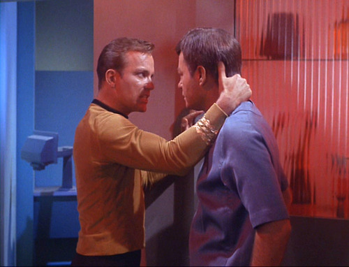 Sweaty Kirk talks forcefully to McCoy