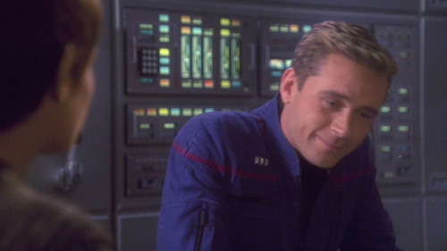 Trip gives a tight smile in response to T'Pol's suggestion
