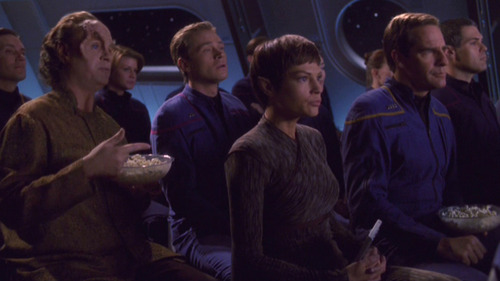Phlox and Trip sit behind T'Pol and Archer at the movie