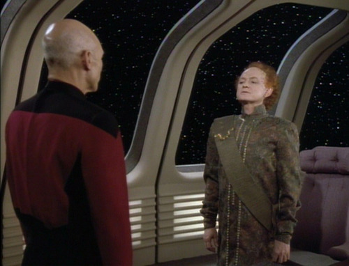 Picard greets Alrik of Valt, a short, red-headed man in a green tunic