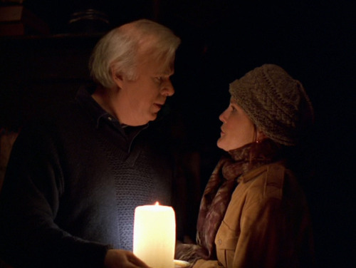 Henry and Shannon in candlelight after the power is cut