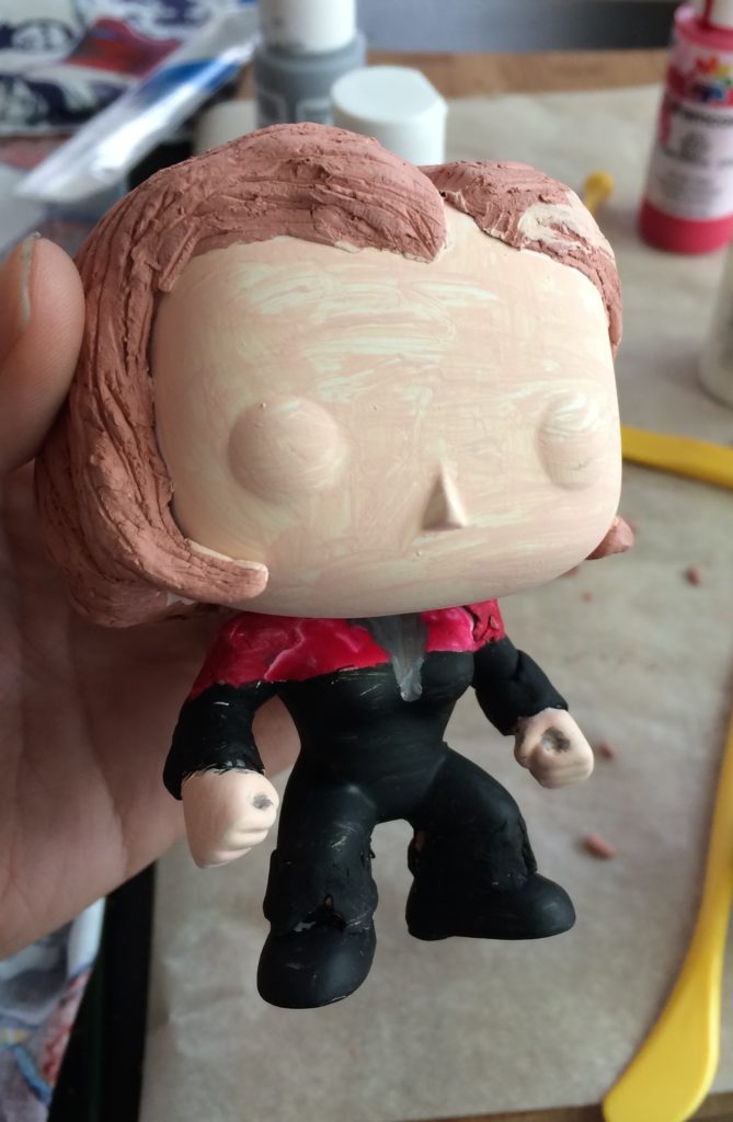 Custom Janeway Funko partly painted with hair sculpted from clay