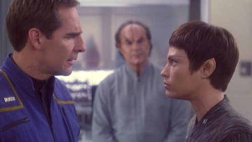 Archer and T'Pol face off while Phlox watches