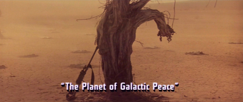 Desert and caption "The Planet of Galactic Peace"