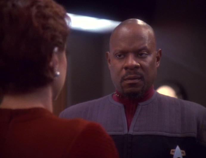 Sisko looks skeptically at Kira