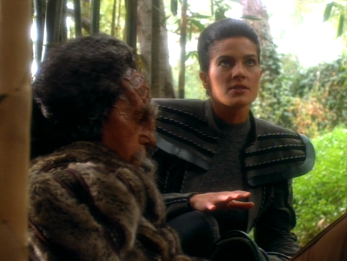 Jadzia and Kang outside the compound