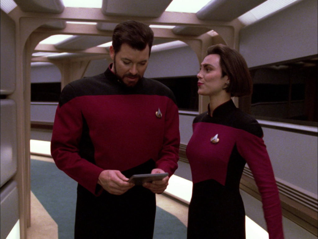Ro flirts with Riker in the corridor