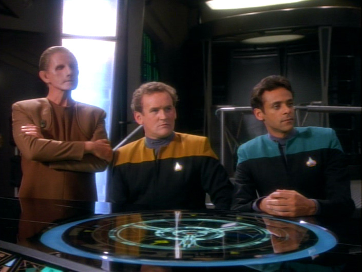 Odo, Miles and Bashir look offended