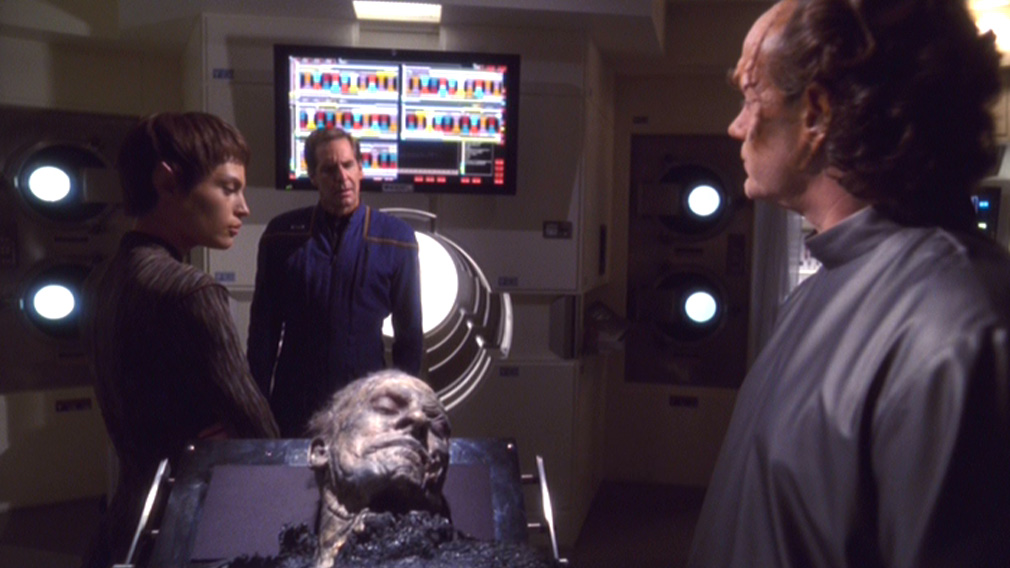 T'Pol, Archer and Phlox examine the body