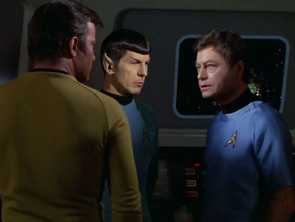 Kirk, Spock and McCoy strategize