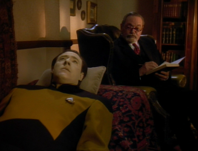 Data lying on Freud's couch in the holodeck