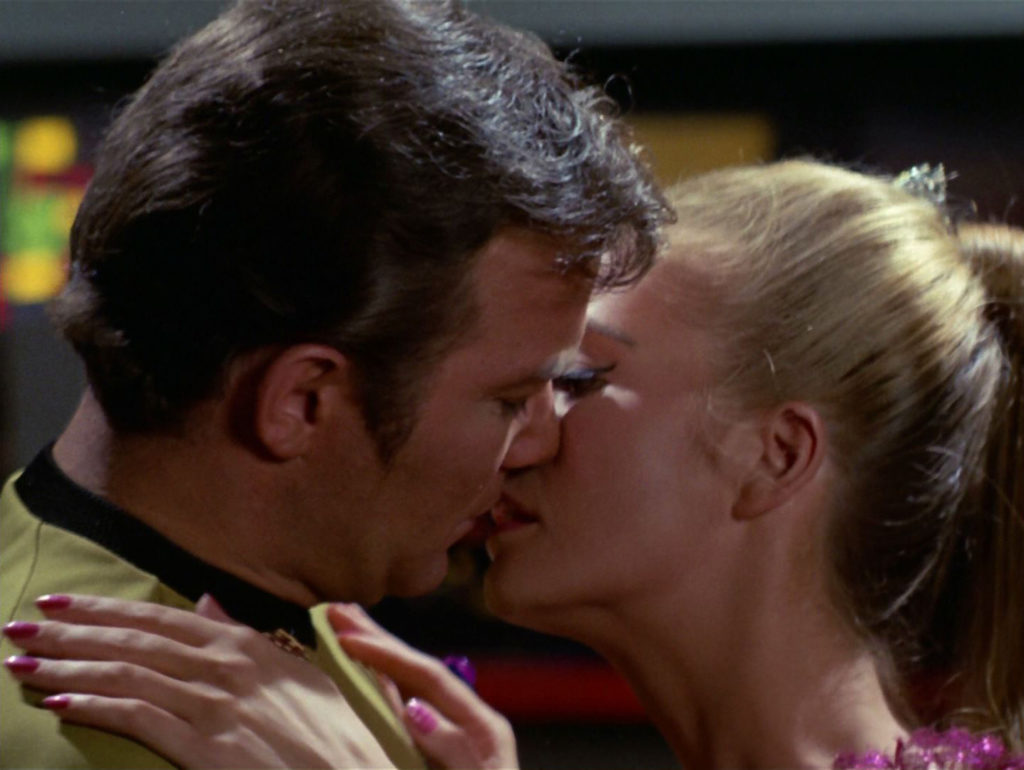 Kirk and Odona kiss