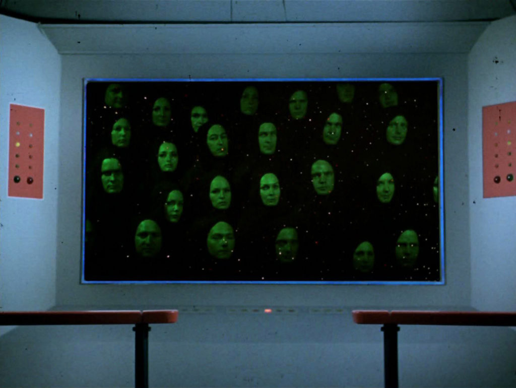 Floating green heads on the viewscreen